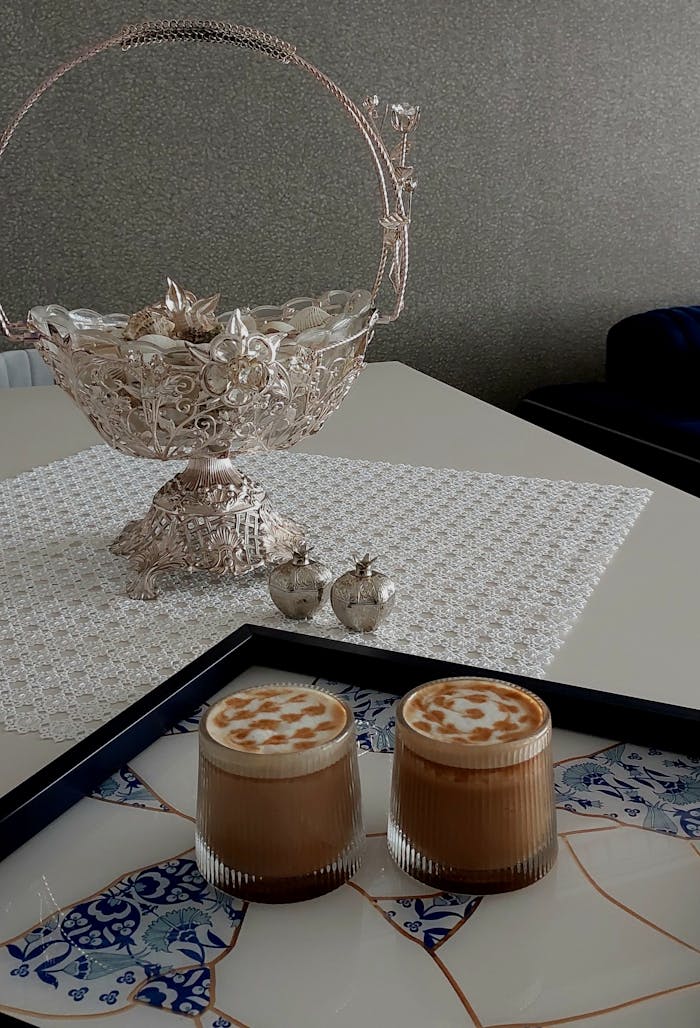 about-02 Luxurious coffee setup with intricate silver basket, perfect for upscale dining decor.